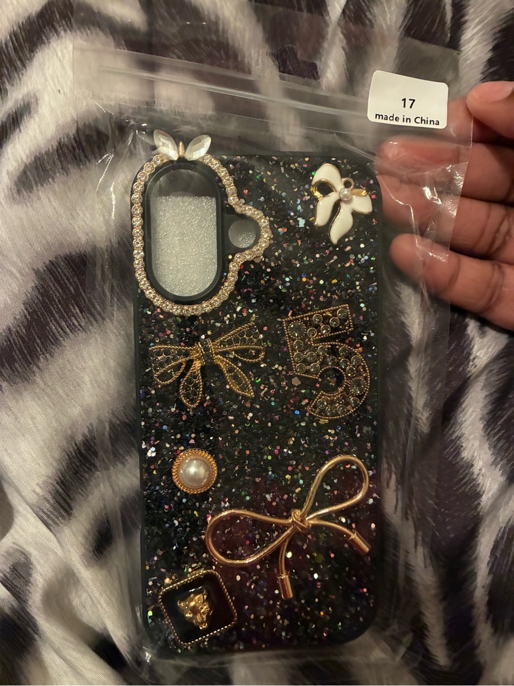 Iphone 17 Stylish  Black Glitter Bow Phone Case with Gold Accents